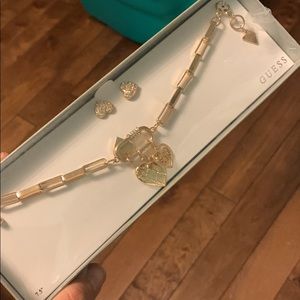 Guess braclet and earrings brand new